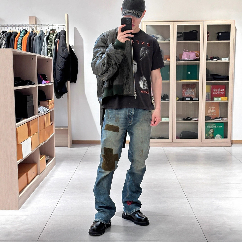 ERD melancholic rich second-generation 25s retro washed knife cuts through holes to make old, burns embroidery stickers, micro flared jeans