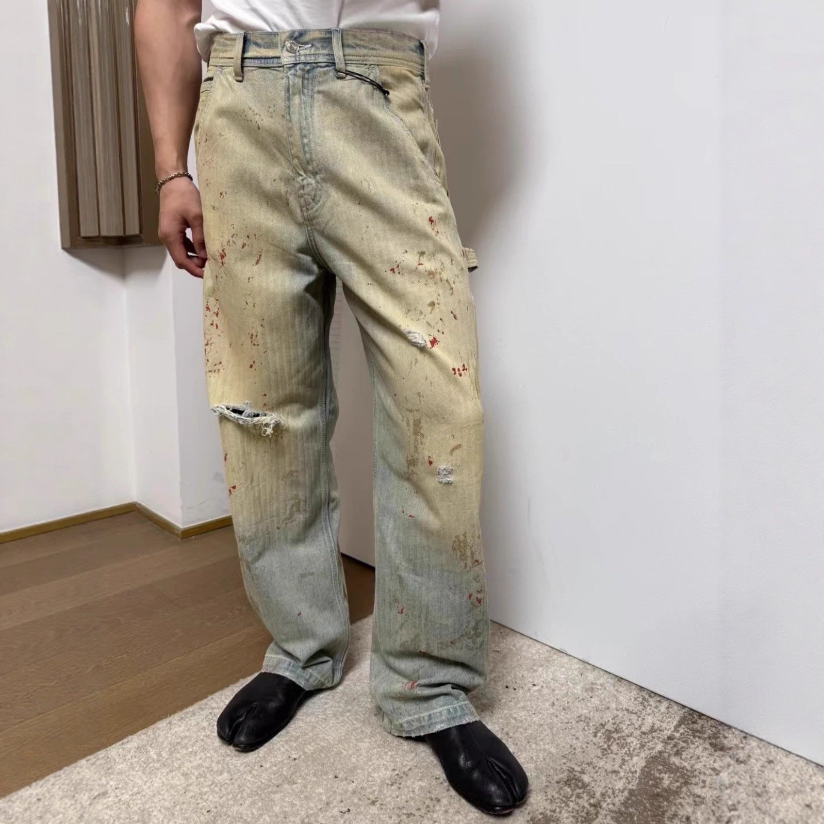 ERD's melancholic wealthy second-generation, heavy water washed, damaged, worn, blood stained, knife cut, dirty, dyed, logging pants, straight leg jeans